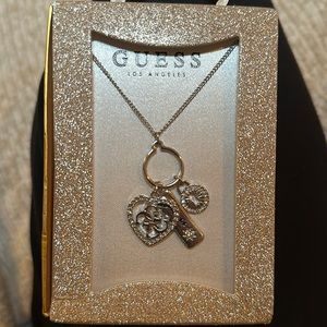 Guess charm necklace